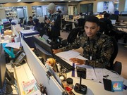Pegawai beraktivitas pada salah satu gedung perkantoran pada hari pertama kerja tahun 2025 di Jakarta, Kamis (2/1/2025). (CNBC Indonesia/Faisal Rahman)