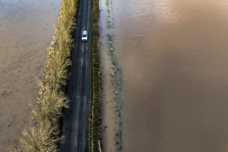 Pemandangan banjir di sekitar taman karavan Little Venice di Yalding, Kent, Inggris, Senin, 6 Januari 2025. (Gareth Fuller/PA via AP) Pemandangan banjir di sekitar taman karavan Little Venice di Yalding, Kent, Inggris, Senin, 6 Januari 2025. (Gareth Fuller/PA via AP)