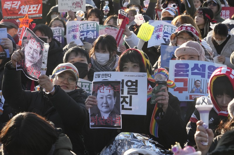 Para pengunjuk rasa menghadiri unjuk rasa menuntut penangkapan Presiden Korea Selatan Yoon Suk Yeol yang dimakzulkan di Seoul, Korea Selatan, Sabtu (11/1/2025). (AP Photo/Ahn Young-joon) Para pengunjuk rasa menghadiri unjuk rasa menuntut penangkapan Presiden Korea Selatan Yoon Suk Yeol yang dimakzulkan di Seoul, Korea Selatan, Sabtu (11/1/2025). (AP Photo/Ahn Young-joon)