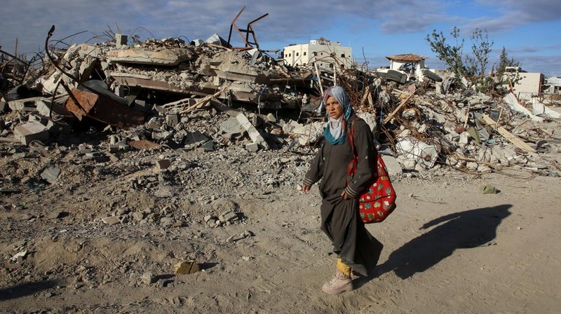 This drone photo shows displaced Palestinians returning to Rafah, a day after the ceasefire deal between Israel and Hamas came into effect, Gaza Strip, Monday, Jan. 20, 2025. (AP Photo/Jehad Alshrafi)