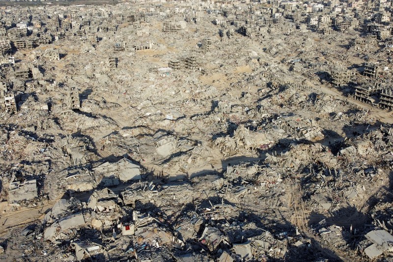 Israel Palestinians This drone photo shows displaced Palestinians returning to Rafah, a day after the ceasefire deal between Israel and Hamas came into effect, Gaza Strip, Monday, Jan. 20, 2025. (AP Photo/Jehad Alshrafi)