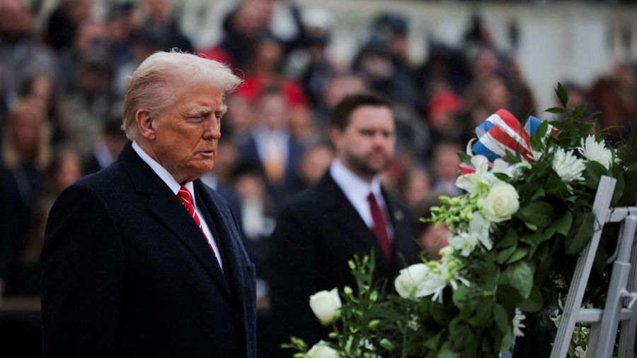 U.S. President-elect Donald Trump and U.S. Vice President-elect JD Vance attend a wreath laying ceremony at Arlington National Cemetery ahead of the presidential inauguration in Arlington, Virginia, U.S. January 19, 2025.  REUTERS/Carlos Barria      TPX IMAGES OF THE DAY