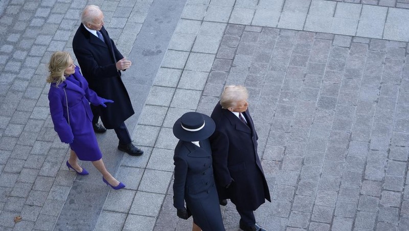 President Donald Trump, from right, and first lady Melania Trump walk to send off former President Joe Biden and Jill Biden after the 60th Presidential Inauguration, Monday, Jan. 20, 2025, at the U.S. Capitol in Washington. (Jack Gruber/Pool Photo via AP)