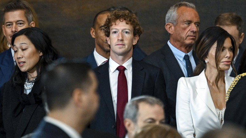 Guests including Mark Zuckerberg, Jeff Bezos, Sundar Pichai and Elon Musk, arrive before the 60th Presidential Inauguration in the Rotunda of the U.S. Capitol in Washington, Monday, Jan. 20, 2025. (AP Photo/Julia Demaree Nikhinson, Pool)