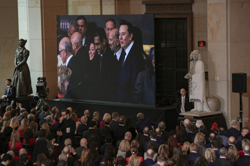 Trump Inauguration Photo Gallery Guests including Mark Zuckerberg, Jeff Bezos, Sundar Pichai and Elon Musk, arrive before the 60th Presidential Inauguration in the Rotunda of the U.S. Capitol in Washington, Monday, Jan. 20, 2025. (AP Photo/Julia Demaree Nikhinson, Pool)