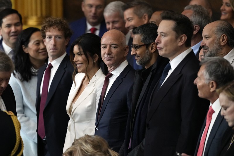 Trump Inauguration Photo Gallery Guests including Mark Zuckerberg, Jeff Bezos, Sundar Pichai and Elon Musk, arrive before the 60th Presidential Inauguration in the Rotunda of the U.S. Capitol in Washington, Monday, Jan. 20, 2025. (AP Photo/Julia Demaree Nikhinson, Pool)