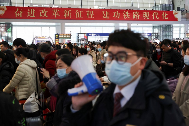People wait for their train at the waiting hall during the Spring festival travel rush ahead of the Lunar New Year, at Shanghai Hongqiao railway station in Shanghai, China, January 24, 2025.  REUTERS/Go Nakamura     TPX IMAGES OF THE DAY
