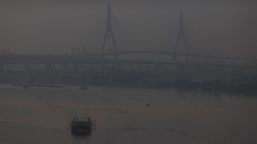 People attend a running event on the newly constructed cable-stayed Rama X Bridge or 