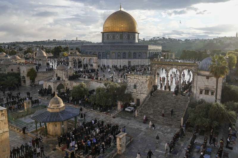 Israel Palestinians Rain clouds loom over the Dome of the Rock Mosque in the Al-Aqsa Mosque compound in the Old City of Jerusalem, Friday, Jan. 24, 2025. (AP Photo/Mahmoud Illean)