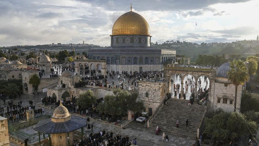 Rain clouds loom over the Dome of the Rock Mosque in the Al-Aqsa Mosque compound in the Old City of Jerusalem, Friday, Jan. 24, 2025. (AP Photo/Mahmoud Illean)