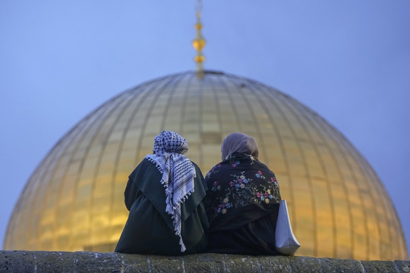 Israel Palestinians Rain clouds loom over the Dome of the Rock Mosque in the Al-Aqsa Mosque compound in the Old City of Jerusalem, Friday, Jan. 24, 2025. (AP Photo/Mahmoud Illean)