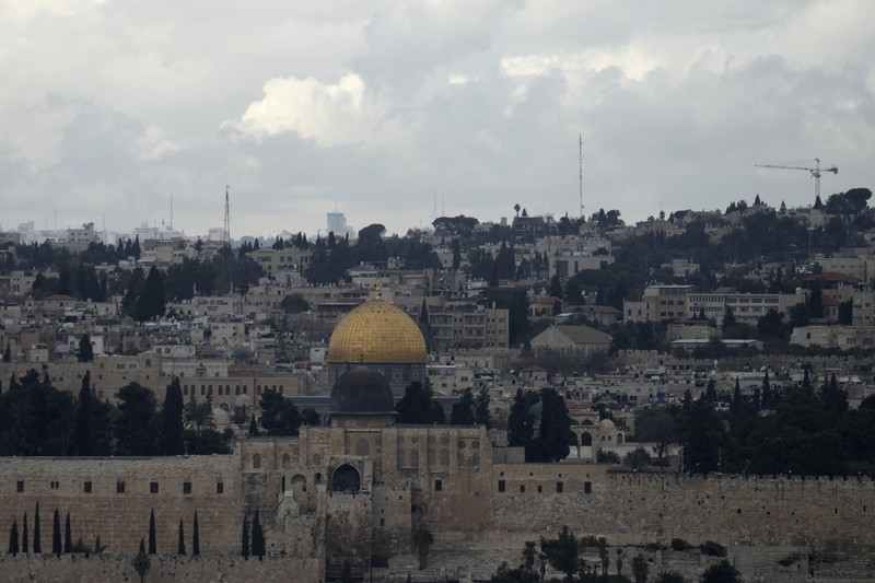 Israel Palestinians Rain clouds loom over the Dome of the Rock Mosque in the Al-Aqsa Mosque compound in the Old City of Jerusalem, Friday, Jan. 24, 2025. (AP Photo/Mahmoud Illean)