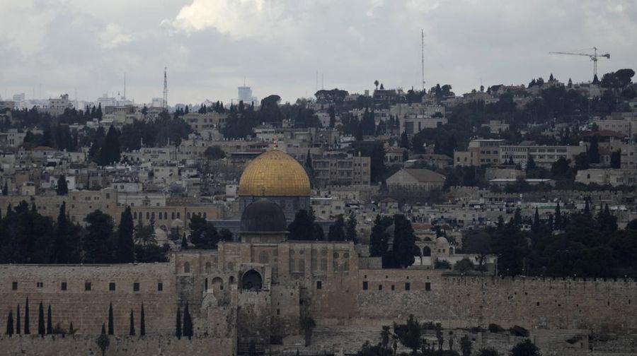 Rain clouds loom over the Dome of the Rock Mosque in the Al-Aqsa Mosque compound in the Old City of Jerusalem, Friday, Jan. 24, 2025. (AP Photo/Mahmoud Illean)