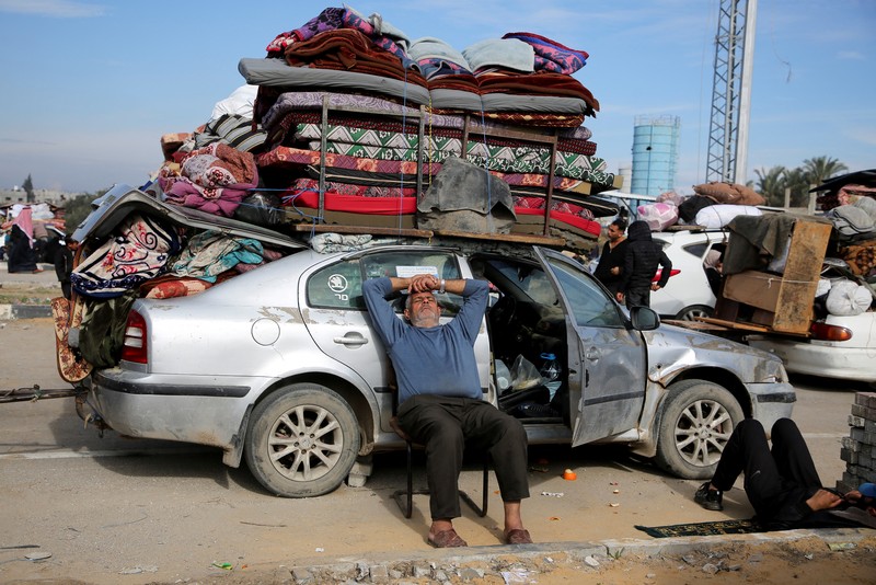 A drone view shows Palestinians waiting to be allowed to return to their homes in northern Gaza after they were displaced to the south at Israel's order during the war, amid a ceasefire between Israel and Hamas, in the central Gaza Strip, January 26, 2025. REUTERS/Stringer     TPX IMAGES OF THE DAY