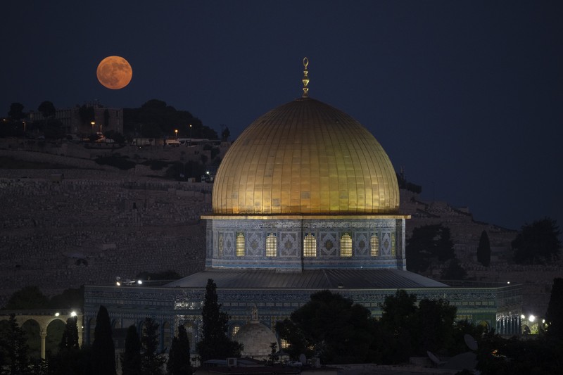 Israel Palestinians Rain clouds loom over the Dome of the Rock Mosque in the Al-Aqsa Mosque compound in the Old City of Jerusalem, Friday, Jan. 24, 2025. (AP Photo/Mahmoud Illean)