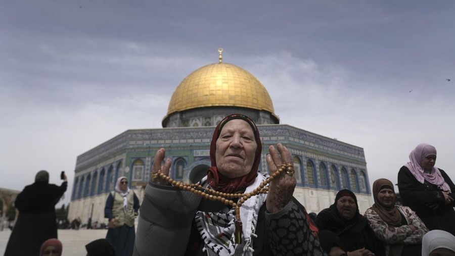 Rain clouds loom over the Dome of the Rock Mosque in the Al-Aqsa Mosque compound in the Old City of Jerusalem, Friday, Jan. 24, 2025. (AP Photo/Mahmoud Illean)