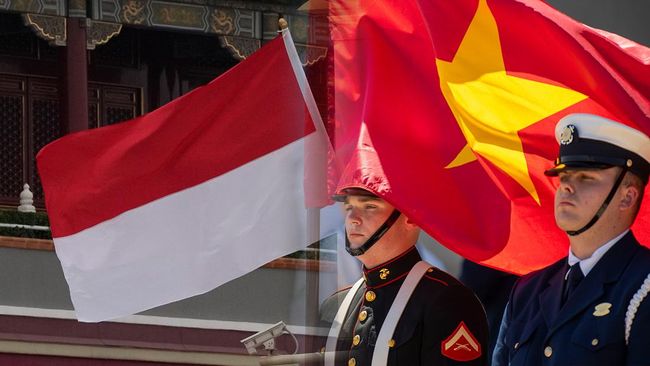 Foto kolase bendera Indonesia dan Vietnam. (AP Photo) Foto kolase bendera Indonesia dan Vietnam. (AP Photo)