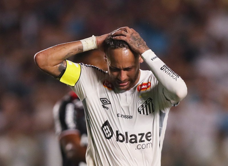 Laga debut pespak bola Santos FC, Neymar saat laga melawan Botafogo FC, Kamis (6/2/2025). (REUTERS/Carla Carniel) Laga debut pespak bola Santos FC, Neymar saat laga melawan Botafogo FC, Kamis (6/2/2025). (REUTERS/Carla Carniel)