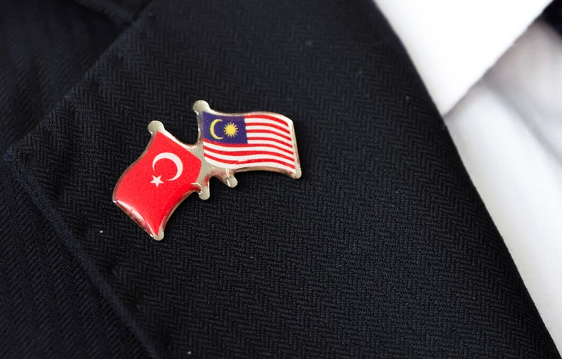 President of Turkey Recep Tayyip Erdogan walks with Malaysian Prime Minister Anwar Ibrahim, in Putrajaya, Malaysia, 11 February 2025.   FAZRY ISMAIL/Pool via REUTERS