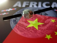 Chinese flag, word "Africa" and satellite model are seen in this illustration taken February 5, 2025. REUTERS/Dado Ruvic/Illustration