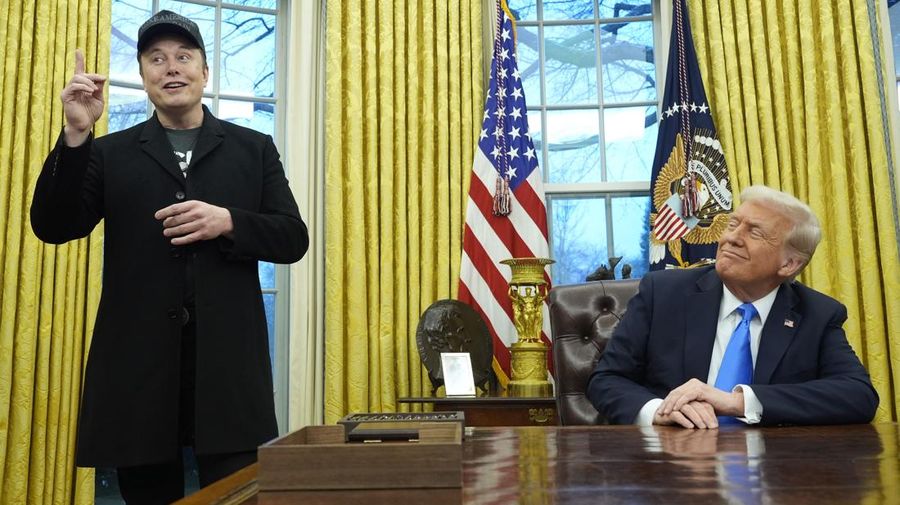 President Donald Trump listens as Elon Musk speaks in the Oval Office at the White House, Tuesday, Feb. 11, 2025, in Washington. (Photo/Alex Brandon)