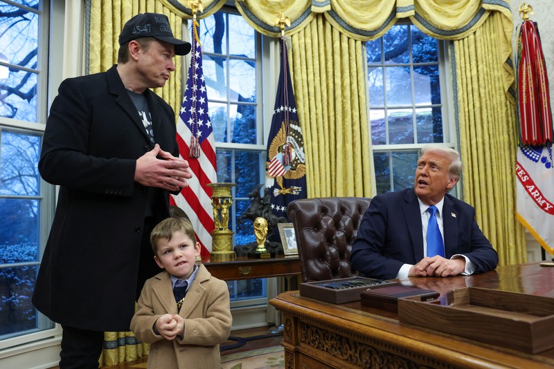 USA-TRUMP/ A combination picture shows Elon Musk speaking as he carries his son, X Æ A-12 on his shoulders, next to U.S. President Donald Trump (not pictured) in the Oval Office of the White House in Washington, D.C., U.S., February 11, 2025. REUTERS/Kevin Lamarque