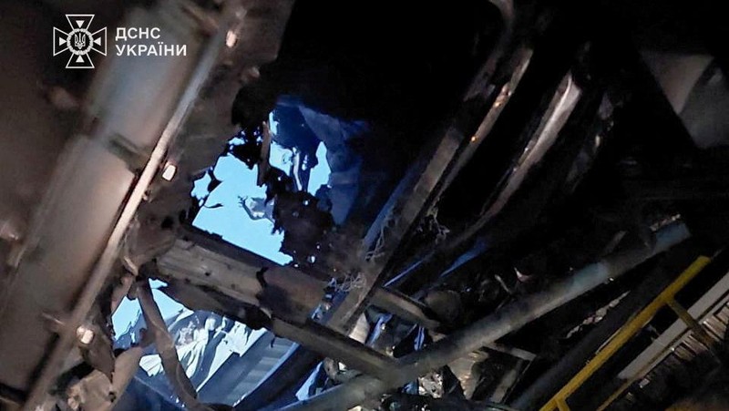 An engine of a Russian kamikaze drone is seen under the New Safe Confinement (NSC) structure, that covers the old sarcophagus which confines the remains of the damaged fourth reactor, after it was hit by what Ukrainian President Volodymyr Zelenskiy said is a Russian drone strike, amid Russia's attack on Ukraine, at the Chornobyl Nuclear Power Plant, in Kyiv region, Ukraine February 14, 2025. Press service of the State Emergency Service of Ukraine/Handout via REUTERS ATTENTION EDITORS - THIS IMAGE HAS BEEN SUPPLIED BY A THIRD PARTY. DO NOT OBSCURE LOGO.