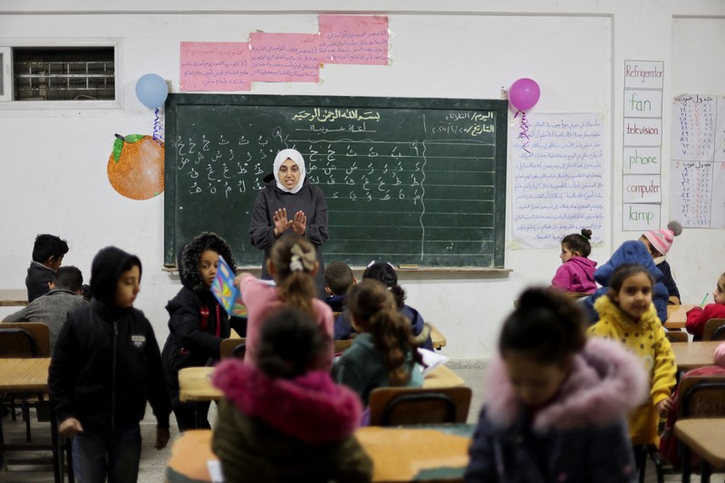 Anak-anak Palestina kembali sekolah saat tahun ajaran baru dimiulai di Jalur Gaza, Selasa (25/2/2025). (REUTERS/Dawoud Abu Alkas) Anak-anak Palestina kembali sekolah saat tahun ajaran baru dimiulai di Jalur Gaza, Selasa (25/2/2025). (REUTERS/Dawoud Abu Alkas)