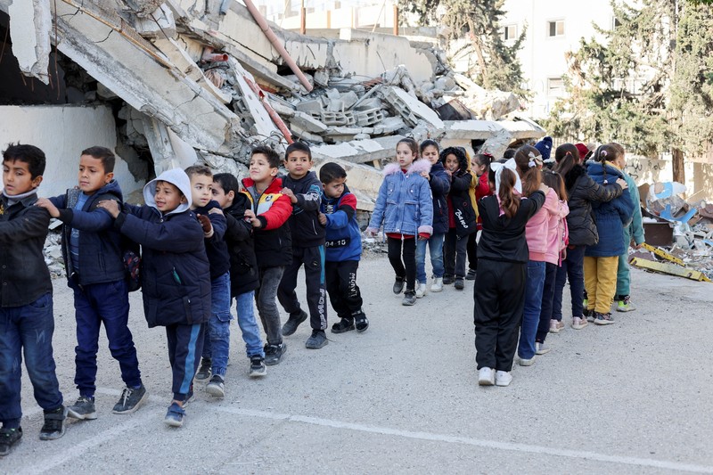 Anak-anak Palestina kembali sekolah saat tahun ajaran baru dimiulai di Jalur Gaza, Selasa (25/2/2025). (REUTERS/Dawoud Abu Alkas) Anak-anak Palestina kembali sekolah saat tahun ajaran baru dimiulai di Jalur Gaza, Selasa (25/2/2025). (REUTERS/Dawoud Abu Alkas)