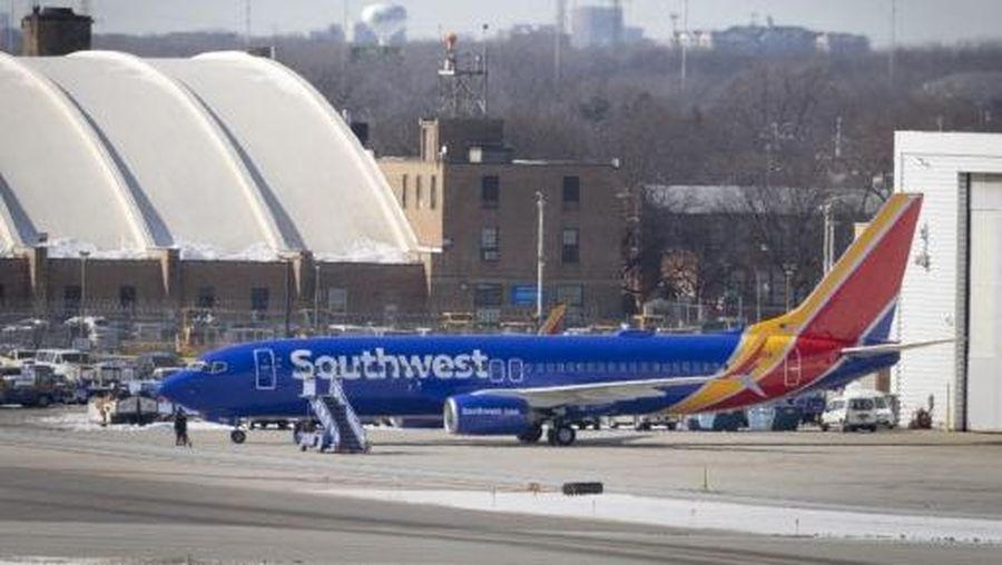 CHICAGO, ILLINOIS - FEBRUARY 18: A Southwest Airlines jet sits in front of a hanger at Chicago Midway International Airport on February 18, 2025 in Chicago, Illinois. The airline said it plans to layoff 1,750 employees, marking the first broad layoffs in the company's history. Scott Olson/Getty Images/AFP (Photo by SCOTT OLSON / GETTY IMAGES NORTH AMERICA / Getty Images via AFP)