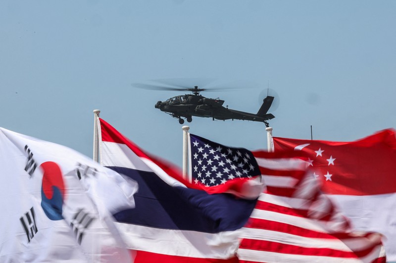 THAILAND-USA/MILITARY DRILL Smoke rises from an amphibious assault vehicles (AAV) participating in an amphibious assault exercise as part of the