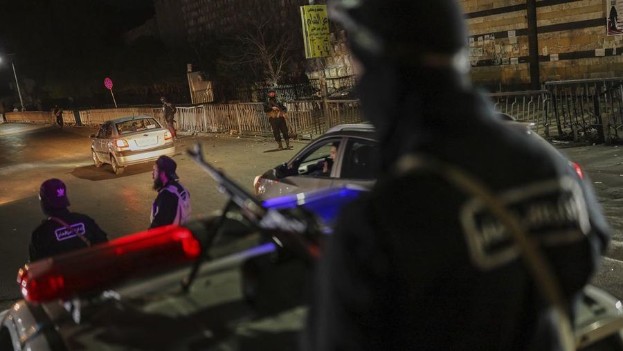 Syrian government forces are deployed amid heightened security in Damascus, Syria, Thursday, March 6, 2025. (AP Photo/Ghaith Alsayed)