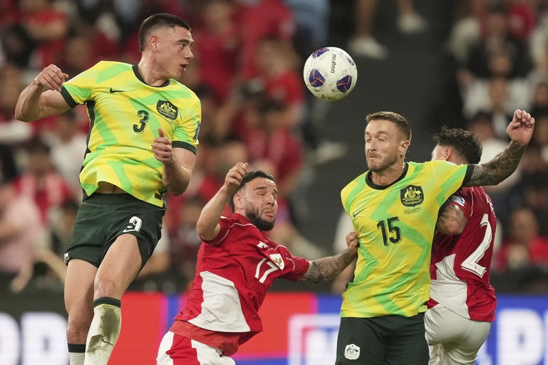 Jackson Irvine dari Australia, kedua dari kiri, merayakan gol ketiga timnya melawan Indonesia selama pertandingan kualifikasi Piala Dunia di Stadion Sepak Bola Sydney, Sydney, Australia, Kamis, 20 Maret 2025. Jackson Irvine dari Australia, kedua dari kiri, merayakan gol ketiga timnya melawan Indonesia selama pertandingan kualifikasi Piala Dunia di Stadion Sepak Bola Sydney, Sydney, Australia, Kamis, 20 Maret 2025. (AP Photo/Mark Baker)