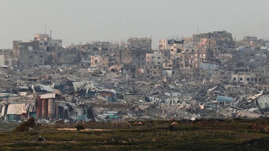 Pandangan umum bangunan yang hancur akibat serangan Israel di Gaza, Rabu (19/3/2025). (REUTERS/Amir Cohen)