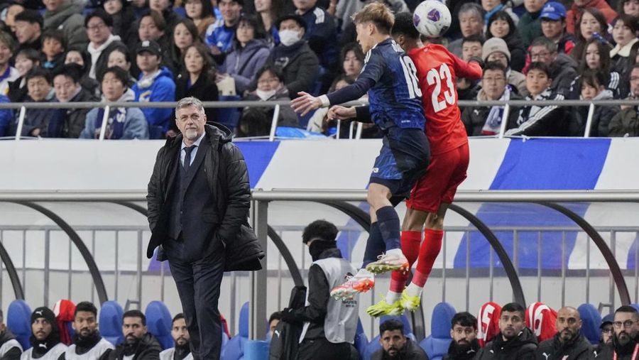 Bahrain's head coach Dragan Talajic watches the players compete during the World Cup qualifying soccer match between Japan and Bahrain at Saitama Stadium in Saitama, Japan, Thursday, March 20, 2025. (AP Photo/Eugene Hoshiko)
