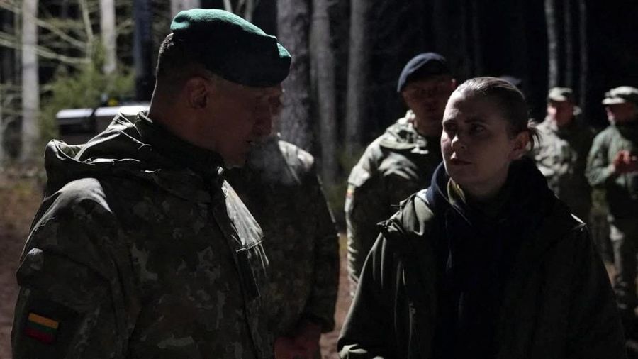 Lithuanian Defence Minister Dovile Sakaliene and Lithuanian Chief of Defence Raimundas Vaiksnoras visit the site of rescue operation at Pabrade training ground, Lithuania, March 26, 2025. LITHUANIAN DEFENCE MINISTRY/Handout via REUTERS THIS IMAGE HAS BEEN SUPPLIED BY A THIRD PARTY. NO RESALES. NO ARCHIVES. MANDATORY CREDIT
