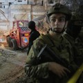 Civil defence and Lebanese army soldiers work at the site of an Israeli targeted strike on an apartment building in Dahiyeh, in the southern suburb of Beirut, Lebanon, early Tuesday, April 1, 2025.(AP Photo/Hussein Malla)