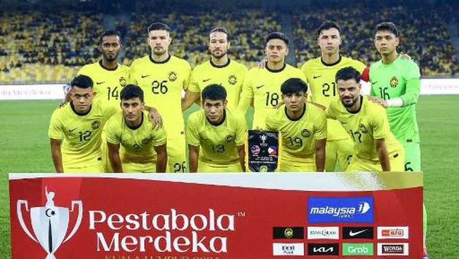 Malaysia's team players pose for the group picture ahead of the international friendly football match between Malaysia and Philippines at Bukit Jalil National Stadium in Kuala Lumpur on September 4, 2024. (Photo by Izzuddin Zulkainan / AFP)