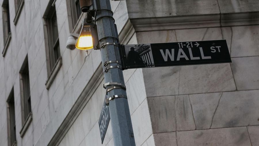 FILE PHOTO: The Wall Street entrance to the New York Stock Exchange (NYSE) is seen in New York City, U.S., November 15, 2022. REUTERS/Brendan McDermid/File Photo
