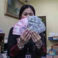 NIlai Tukar Rupiah Makin Turun, Dolar AS Hampir ke Rp16.500