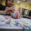 Rupiah Ditutup Menguat, Nilai Tukar Dolar AS Turun ke Rp16.510