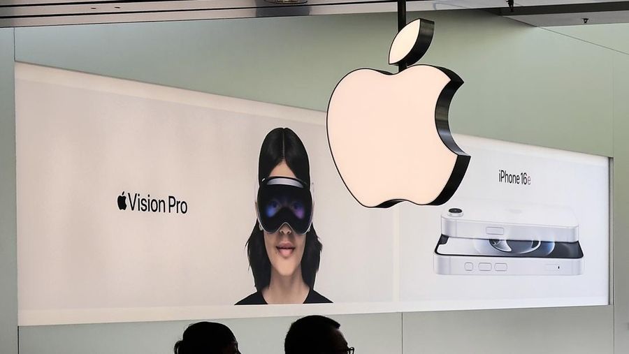 Chinese people visit an Apple Store, inside a shopping mall, in Beijing, Thursday, April 10, 2025. (AP Photo/Andy Wong)