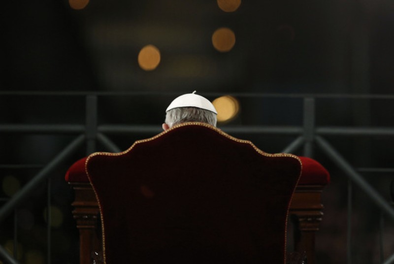 FILE - Pope Francis presides the Via Crucis (Way of the Cross) torchlight procession celebrated in front of the Colosseum on Good Friday in Rome, Friday, March 29, 2013.  (AP Photo/Andrew Medichini, File)