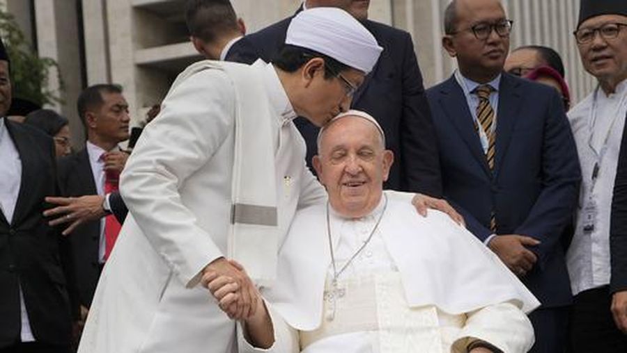 FILE - The Grand Imam Nasaruddin Umar, left, bids farewell to Pope Francis, as he leaves after signing the