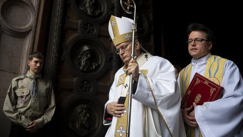 Catholic faithful sit in front an icon of the Virgin Mary at the Santa Maria Maggiore Basilica, Tuesday, Feb. 25, 2025. (AP Photo/Bernat Armangue)