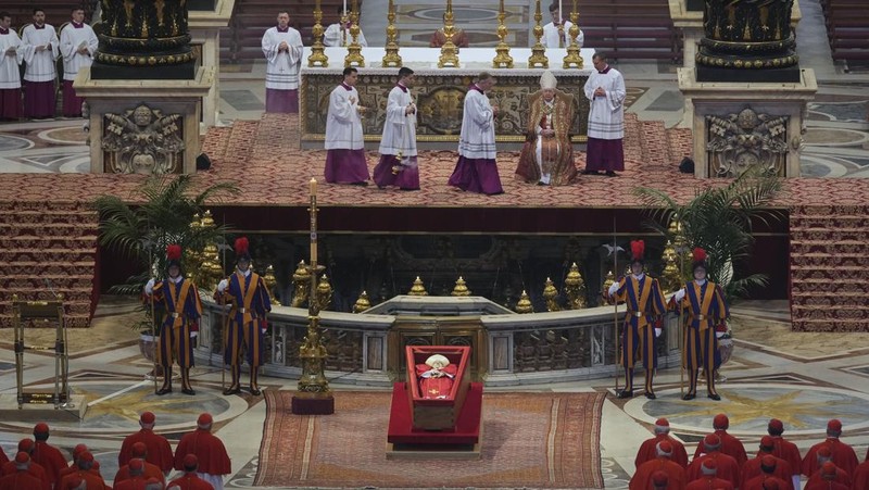 The body of Pope Francis lies inside St. Peter's Basilica at the Vatican, Wednesday, April 23, 2025, where he will lie in state for three days. (AP Photo/Andrew Medichini, Pool)