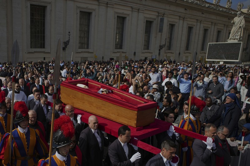 The body of Pope Francis lies inside St. Peter's Basilica at the Vatican, Wednesday, April 23, 2025, where he will lie in state for three days. (AP Photo/Andrew Medichini, Pool)