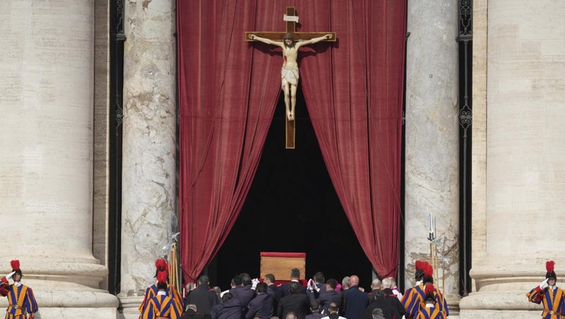 The body of Pope Francis lies inside St. Peter's Basilica at the Vatican, Wednesday, April 23, 2025, where he will lie in state for three days. (AP Photo/Andrew Medichini, Pool)