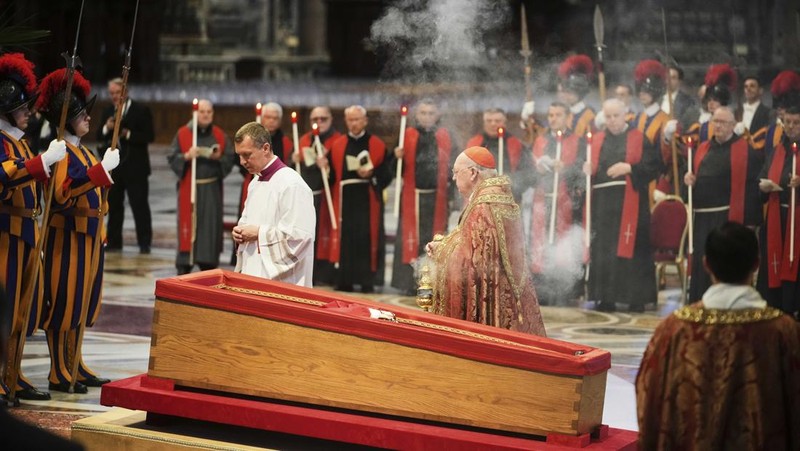 The body of Pope Francis lies inside St. Peter's Basilica at the Vatican, Wednesday, April 23, 2025, where he will lie in state for three days. (AP Photo/Andrew Medichini, Pool)