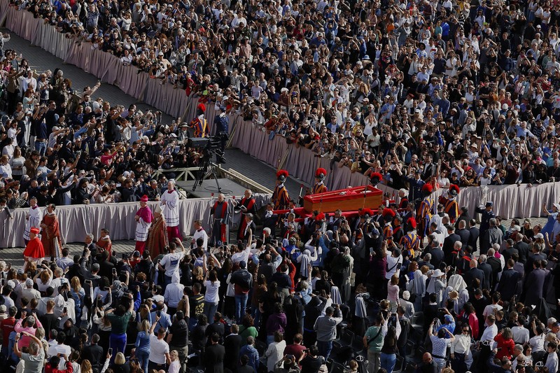 The body of Pope Francis lies inside St. Peter's Basilica at the Vatican, Wednesday, April 23, 2025, where he will lie in state for three days. (AP Photo/Andrew Medichini, Pool)